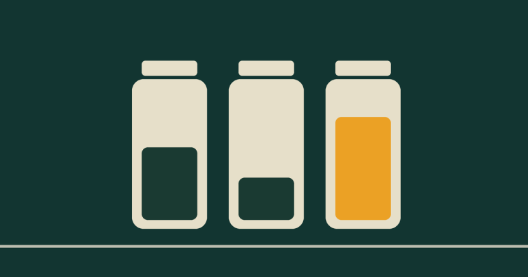 Three jars filled to different levels, the fullest in dawn gold.